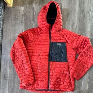 Men’s red and black Mountain hardwear puffer jacket
